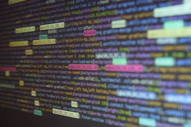 Close-up of colorful website code on a computer monitor