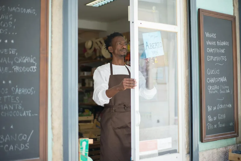 Local small-business owner standing in their shop