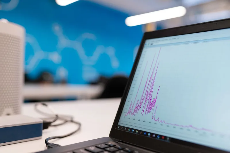 Laptop screen showing a line chart of website traffic data