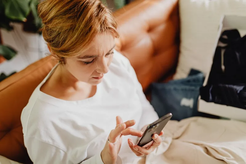 Person using a small-business website on their phone